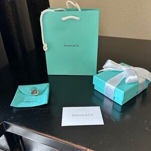 Tiffany & Company Sterling Silver Heart “ Sister” Padlock Charm.